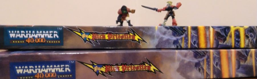 Miniatures on rulebooks